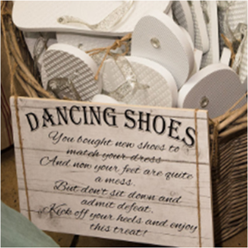 Wooden dancing shoes flip flop sign