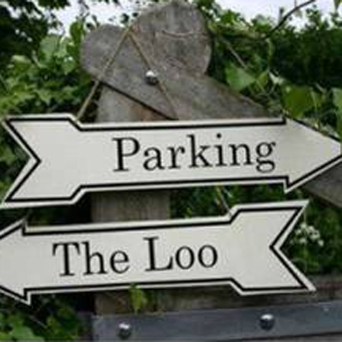 Metal enamel parking the loo outdoor arrow sign