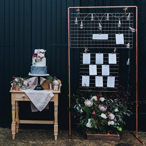 Copper frame table plan backdrop