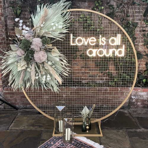 Gold circle arch and neon